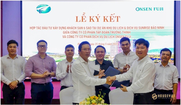 Đại diện hai bên tại lễ ký kết.