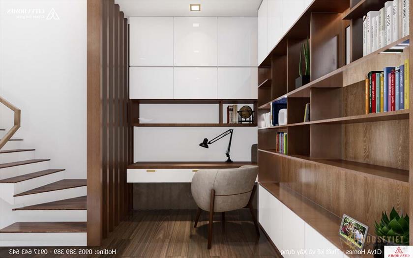 Không gian làm việc được bố trí ngay cạnh tủ sách