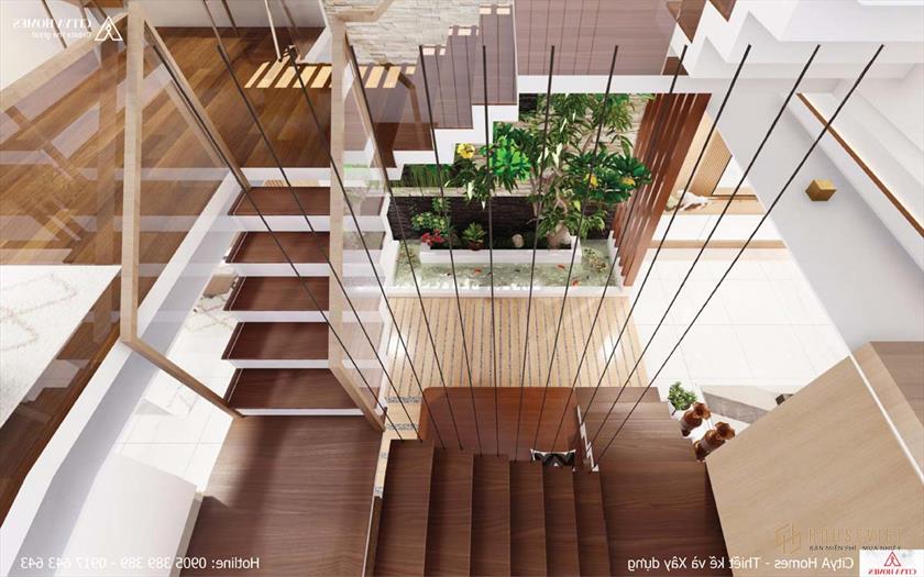 Khoảng xanh được bố trí giữa không gian giữa phòng khách và phòng bếp.