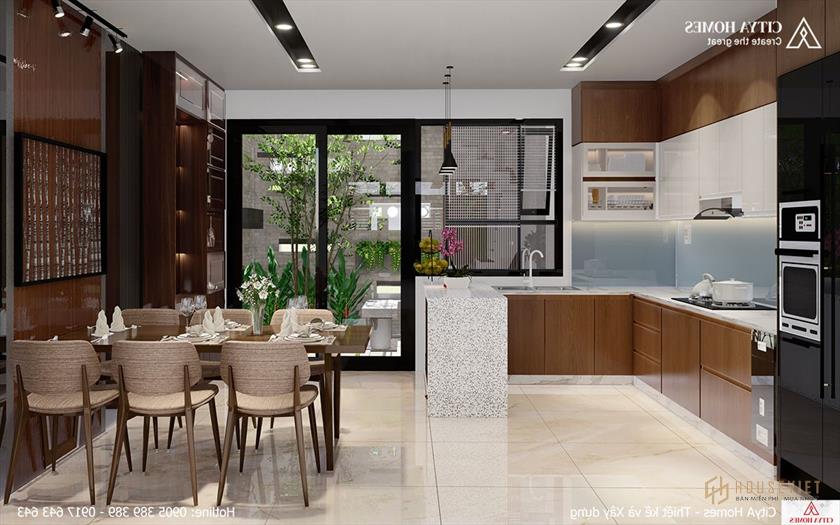 Phòng bếp được bố trí nhìn ra hướng không gian xanh.