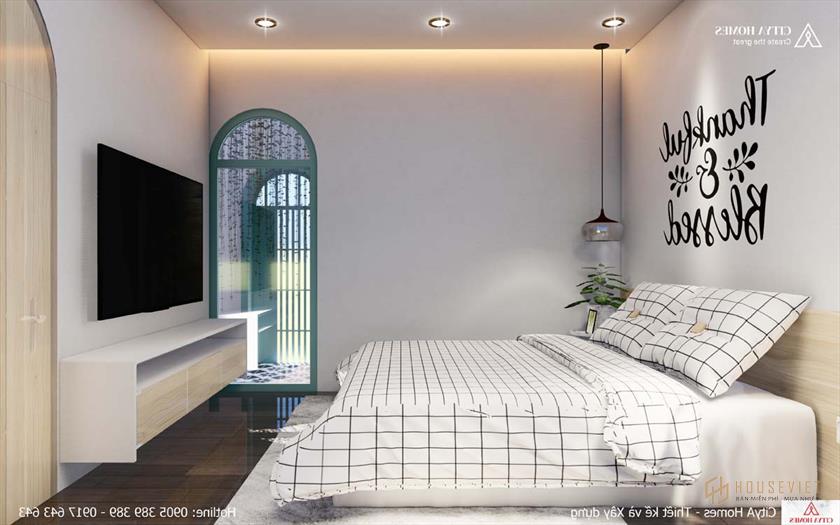 Phòng ngủ được thiết kế với nội thất kẻ sọc tinh tế