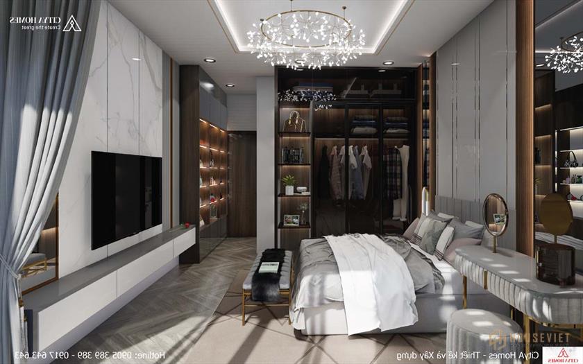 Phòng ngủ master đẳng cấp với tủ quần áo và bàn trang điểm được thiết kế hiện đại, bắt mắt