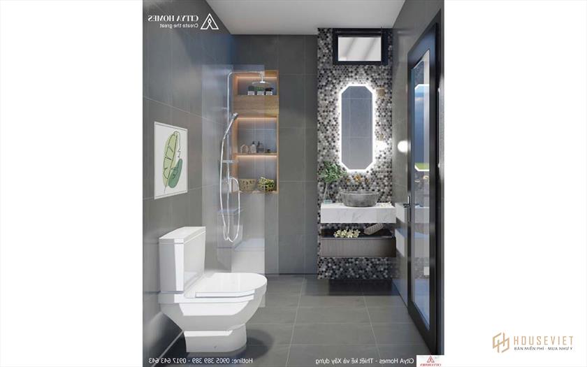 Phòng tắm nổi bật với các tấm đá lục giác được trang trí xung quanh gương sáng