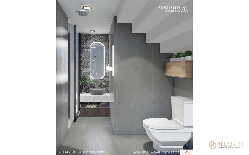 Nhà vệ sinh được bố trí sau cầu thang tận dụng tối đa diện tích