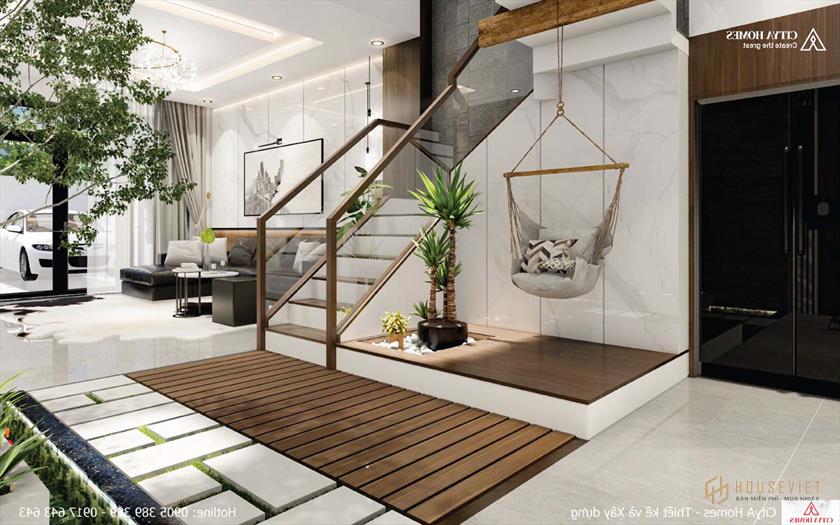 Xích đu xuất hiện dưới chân cầu thang tạo cơ hội cho các thành viên thư giãn, nghỉ ngơi