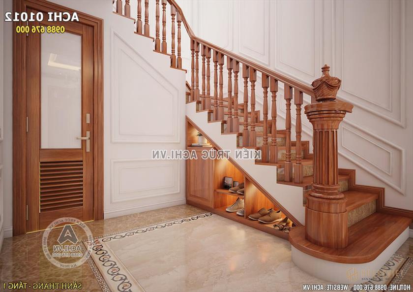 Khu vực gầm cầu thang được tận dụng làm kệ giày dép tiện lợi.