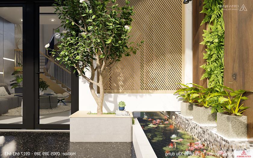 Bể cá cảnh hiện diện cả trong và ngoài nhà, vừa giúp tạo điểm nhấn vừa phù hợp với gia chủ mệnh kim.