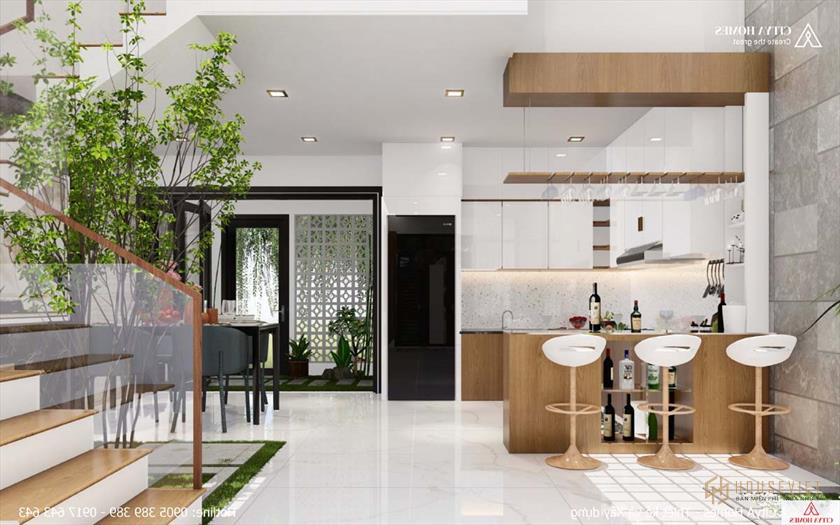 Phòng bếp thông thoáng và lộng gió nhờ gạch bông gió phía sau.