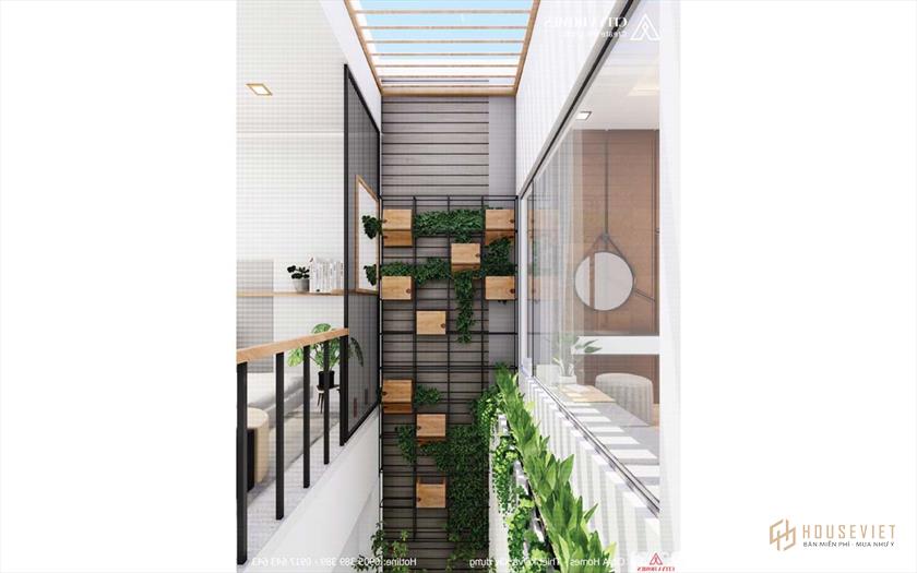 Hệ thống giếng trời trải dài từ tầng 2 đến tầng trệt mang thiên nhiên đến từng ngóc ngách của ngôi nhà