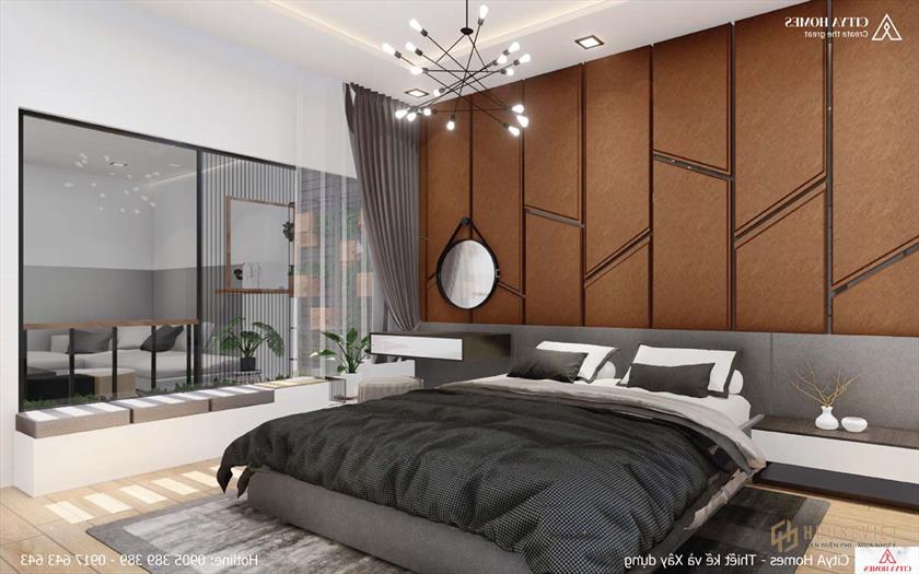 Phòng ngủ chính nổi bật với mảng tường trang trí bằng gỗ tối màu