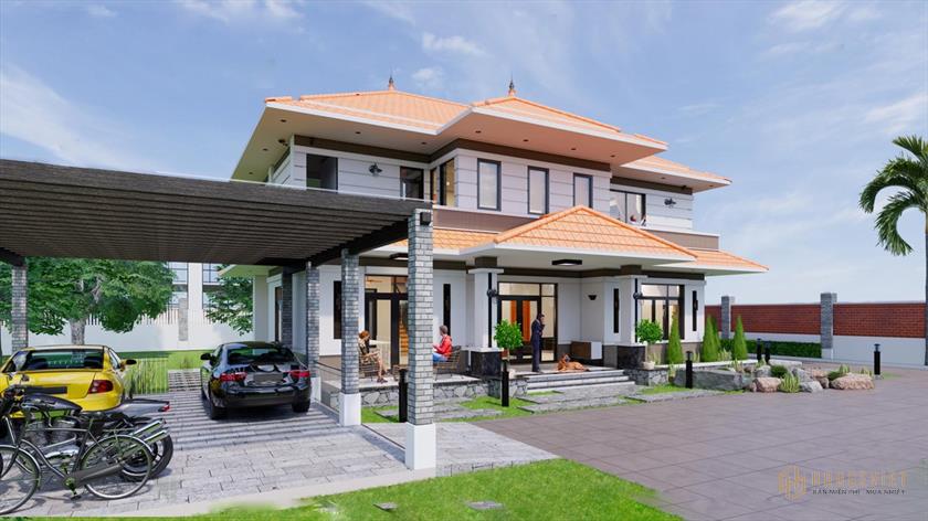 Le garage extérieur de la villa de jardin de 2 étages avec toit en tuiles est aéré et spacieux