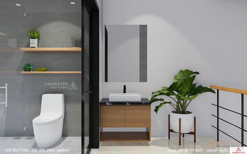 Khu vực tắm giặt được ngăn cách bằng cửa kính lớn chịu nước.