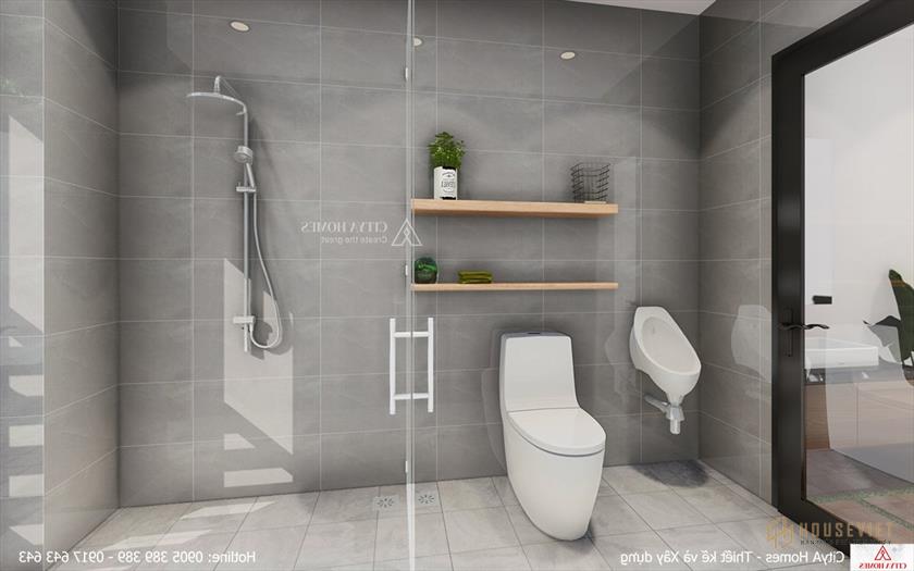 Phòng tắm rộng rãi với tông màu trắng xám.