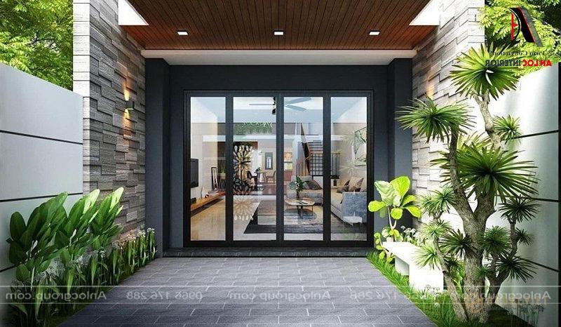 Màu xanh thiên nhiên bao phủ lối vào phòng khách mang đến cảm giác dễ chịu và ấn tượng