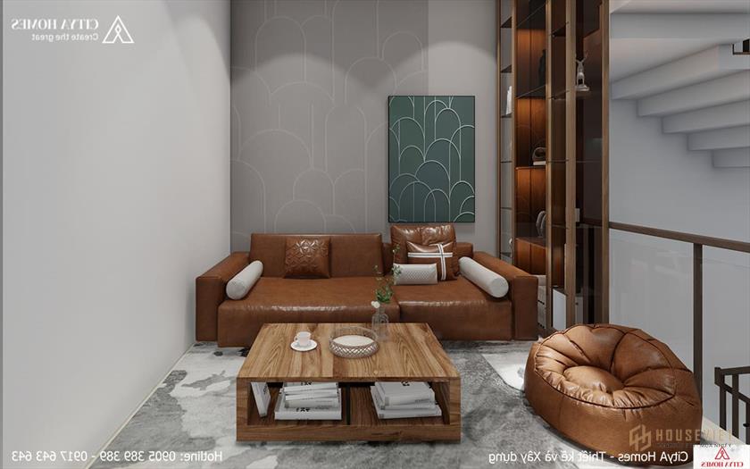 Không gian sinh hoạt chung ấm áp với ghế sofa cùng màu với chất liệu gỗ đặc trưng