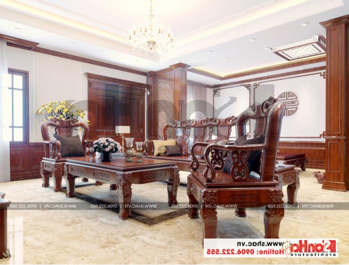 On the 5th floor of the villa, there is also a living room with wooden furniture 