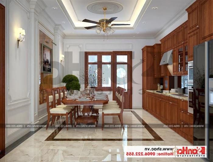 Mẫu biệt thự tân cổ điển 3 tầng mặt tiền rộng 10m tại Hà Nội - SH BTP 0132 12 Thiết kế nội thất phòng bếp và phòng ăn với nội thất gỗ tự nhiên mang đến không gian ấm cúng