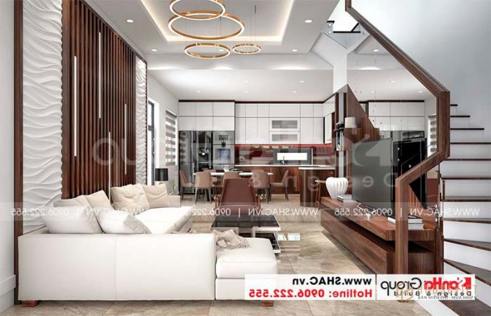 Mẫu thiết kế nhà phố hiện đại 3 tầng mái bằng 5x11,95m tại Hải Phòng - SH NOD 0216 28 Thiết kế phòng khách hiện đại với bàn ghế gỗ tự nhiên và bộ sofa cao cấp