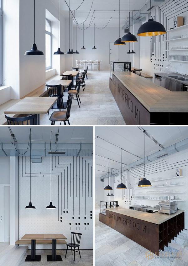 Quán cafe được thiết kế theo phong cách hiện đại với tông màu trắng xám chủ đạo