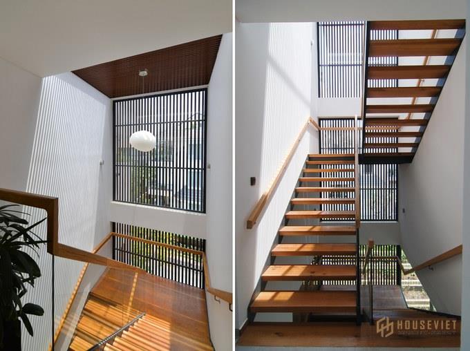 Cầu thang mở phù hợp với kiến trúc hiện đại của thiết kế biệt thự có hồ bơi