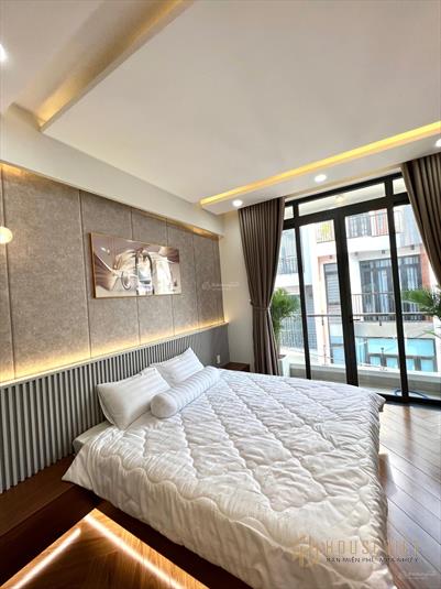Bán nhà 1 trệt 2 lầu sân thượng, hẻm thông xe hơi 6m
